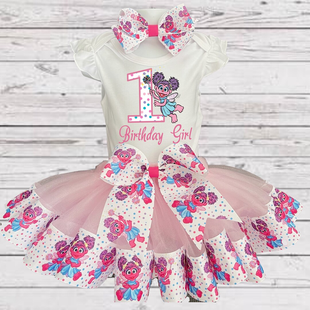 Baby Toddler Girls ABBY CADABBY Birthday Tutu Outfit | Ribbon Tutu, Matching Tshirt or Onesie and Headband | BIRTHDAY SESAME STREET Dress | MakerPlace by Michaels Baby Toddler Girls ABBY CADABBY Birthday Tutu Outfit | Ribbon Tutu, Matching Tshirt or Onesie and Headband | BIRTHDAY SESAME STREET Dress | MakerPlace by Michaels